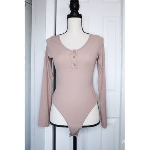 Pretty Little Things Blush Pink Bodysuit Size 6